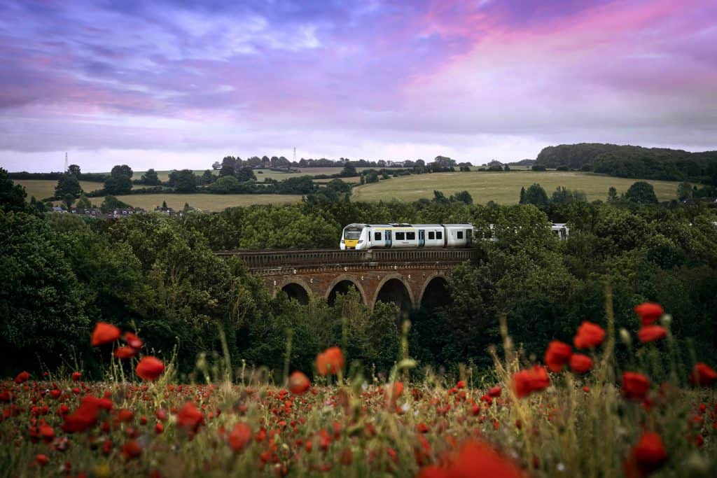 Thameslink train on viaduct in countryside